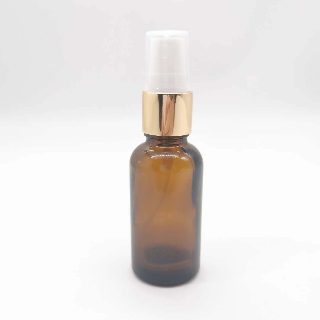 wholesale 30ml amber glass essential oil bottle with aluminum pump sprayer