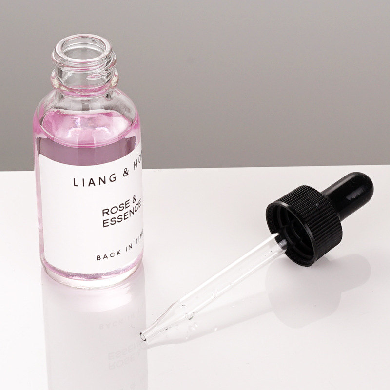 wholesale 30ml boston round bottle clear empty glass dropper bottle 1oz 2oz for essential oil