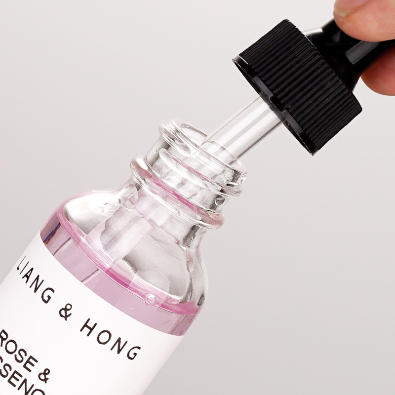 wholesale 30ml boston round bottle clear empty glass dropper bottle 1oz 2oz for essential oil