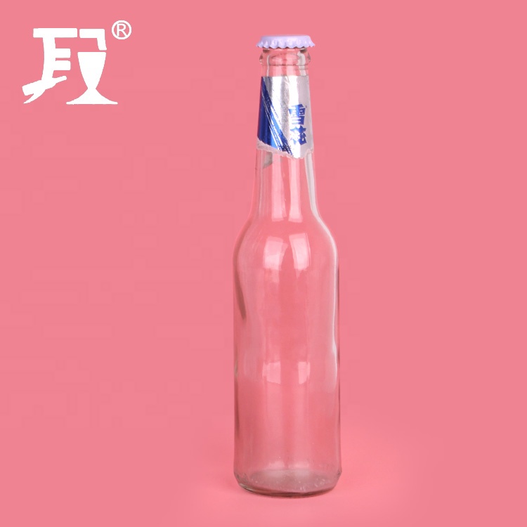 wholesale 330ml empty clear recycled glass beer bottle with crown cap