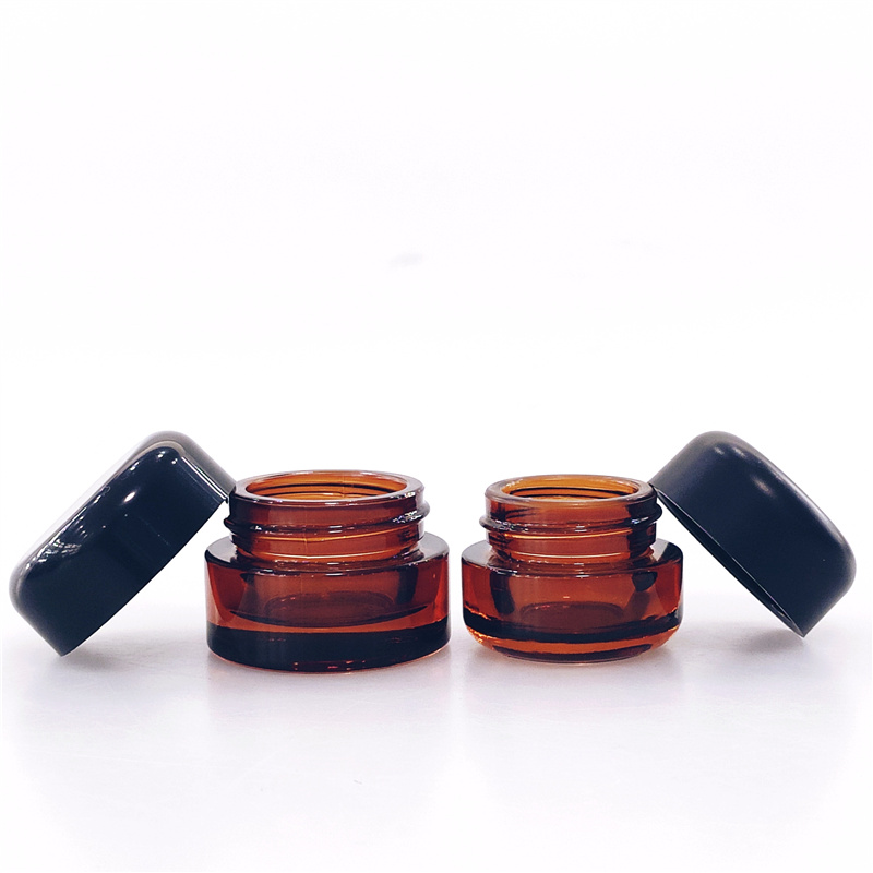wholesale 3ml 5ml 7ml clear glass jar with child resistant lid hemp childproof glass bottle jar weed plastic lid containers