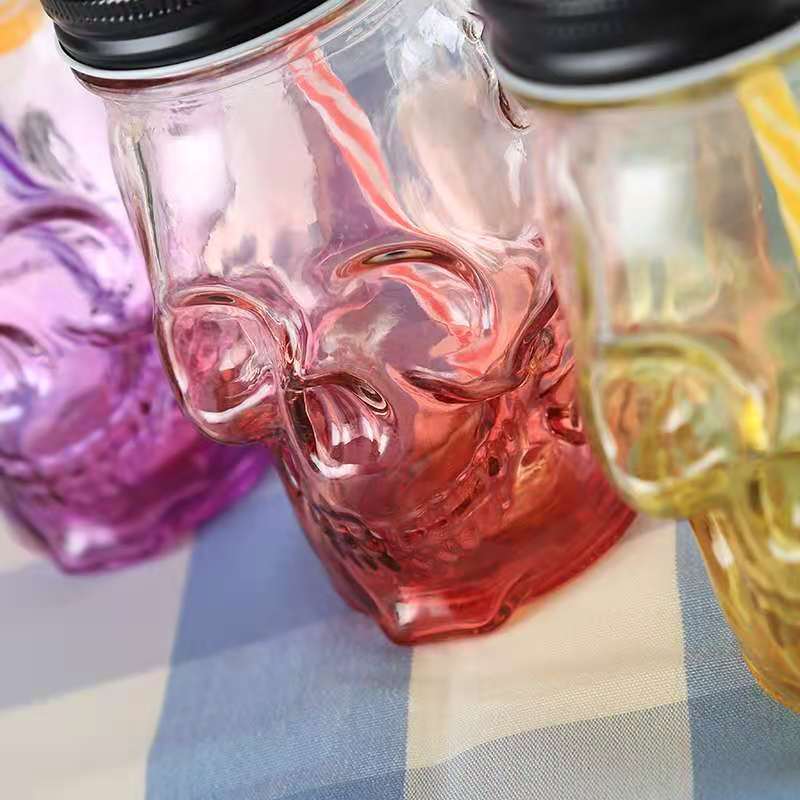 wholesale 500ml skull glass mason jars embossment 480ml Glass Jar with handle and screw lid