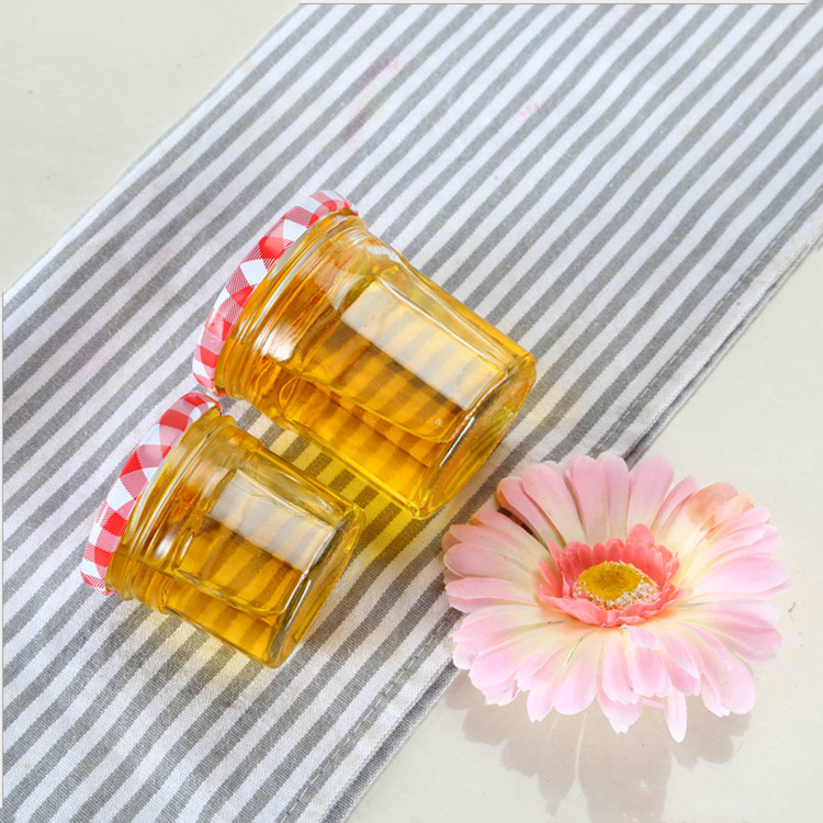 wholesale 50ml-380ml clear polygonal glass canning jar for jam with colored lid