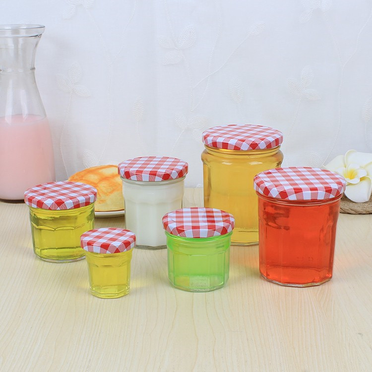 wholesale 50ml-380ml clear polygonal glass canning jar for jam with colored lid