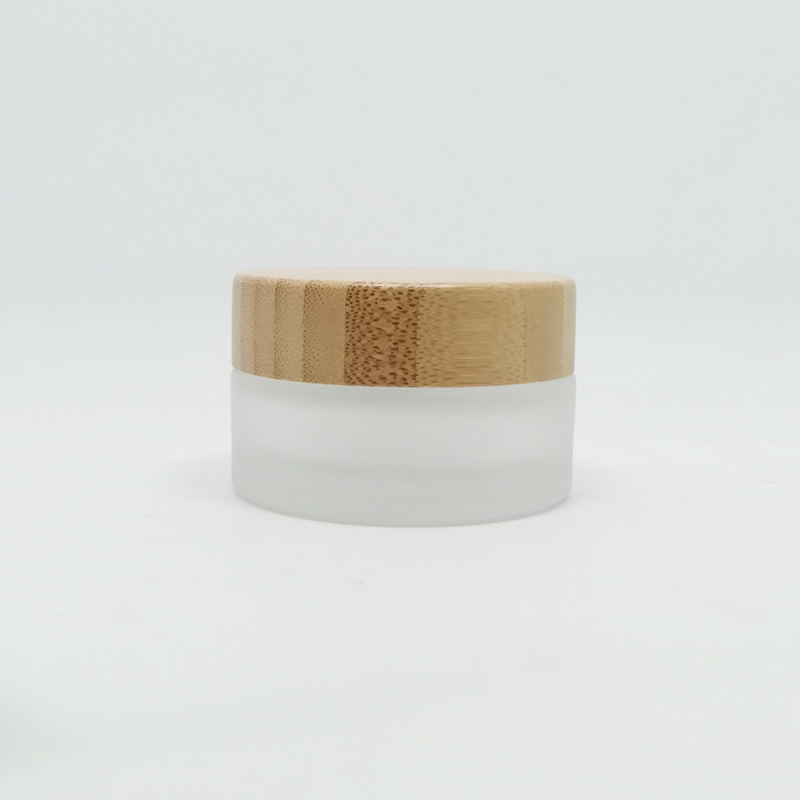 wholesale 5g 10g 15g 20g 30g 50g 60g clear frosted glass cosmetic packaging skincare cream jars with bamboo lids round jars