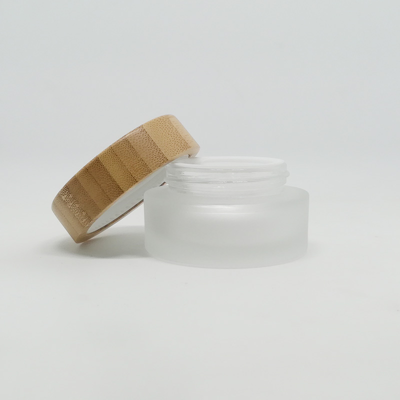 wholesale 5g 10g 15g 20g 30g 50g 60g clear frosted glass cosmetic packaging skincare cream jars with bamboo lids round jars