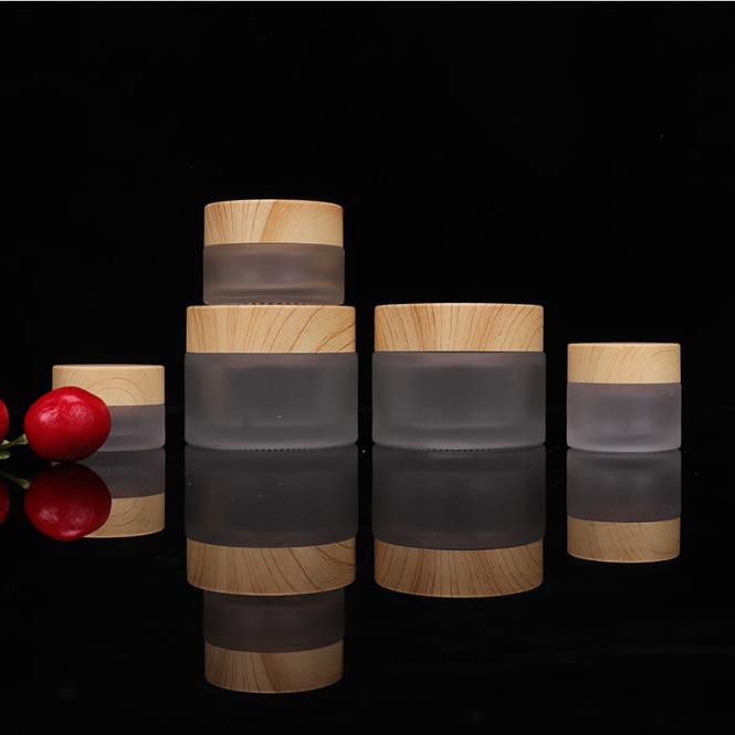 wholesale 5g 10g 15g 20g 30g 50g 60g clear frosted glass cosmetic packaging skincare cream jars with bamboo lids round jars