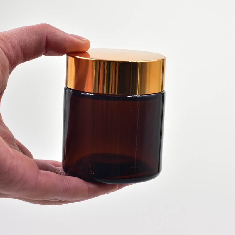 wholesale 5g 10g 20g 30g 50g amber round screw top body lotion containers eye cream skin care cream jar cosmetic glass jar