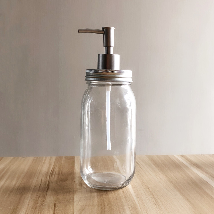 wholesale 700ml clear round glass storage jar with pump lid for shampoo