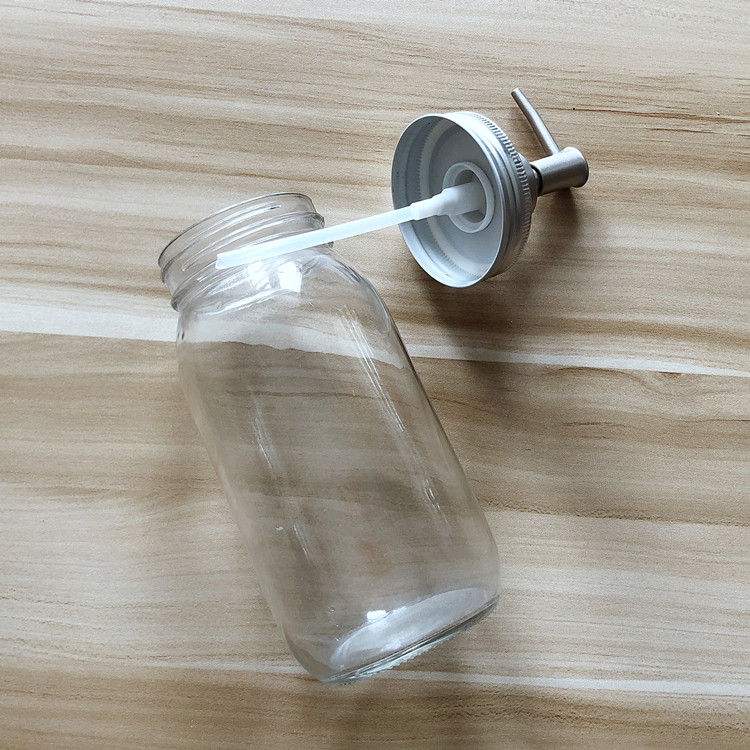 wholesale 700ml clear round glass storage jar with pump lid for shampoo