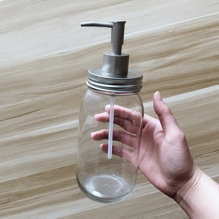 wholesale 700ml clear round glass storage jar with pump lid for shampoo