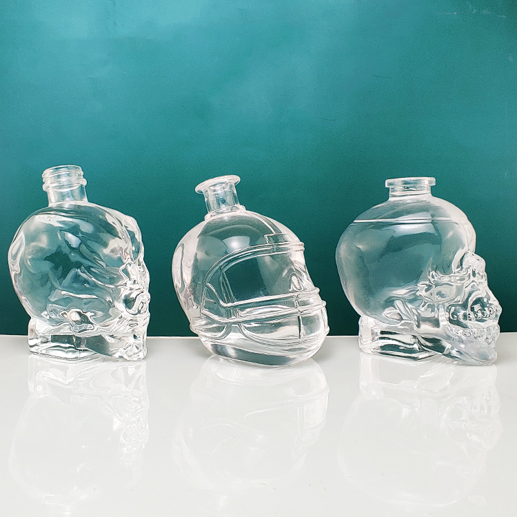 wholesale 750ml skull shape whiskey vodka spirits glass bottle Empty White Unique 700ml Vodka Glass Skull Bottle