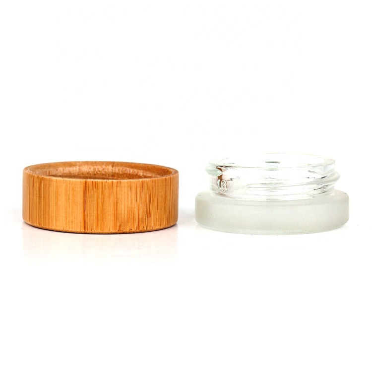 wholesale 7ml 10ml empty cosmetic skin care glass jar bottle for face cream lotion with bamboo wooded lid