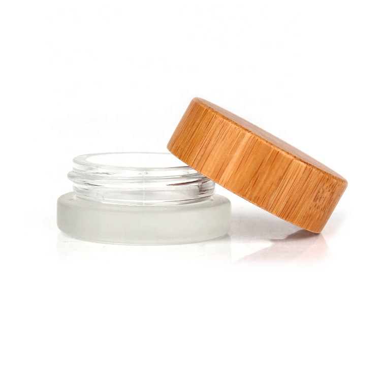 wholesale 7ml 10ml empty cosmetic skin care glass jar bottle for face cream lotion with bamboo wooded lid