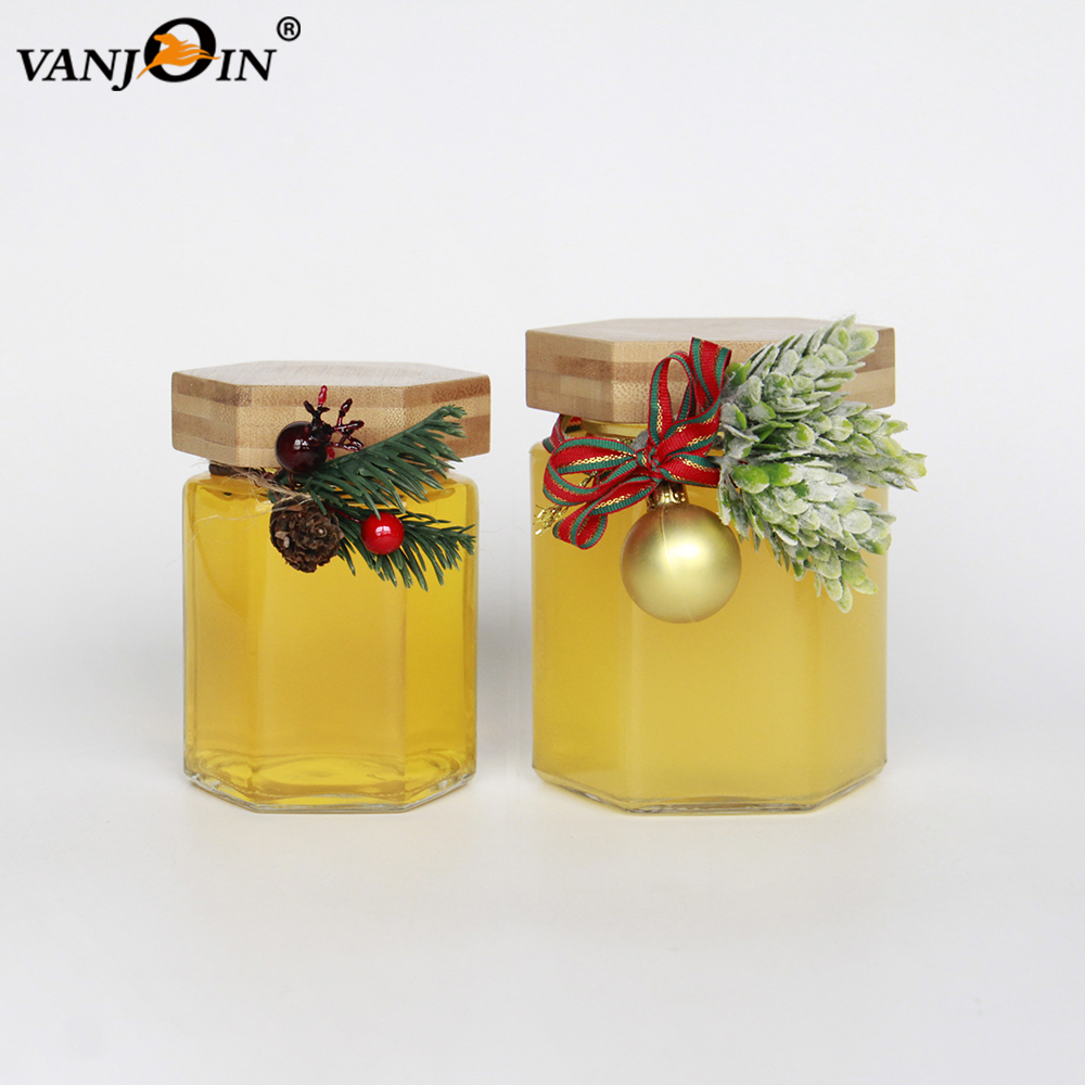 wholesale Empty Hexagonal Glass Jars with Wooden Lids honey bee jam filling containers 250ml 350ml for sale