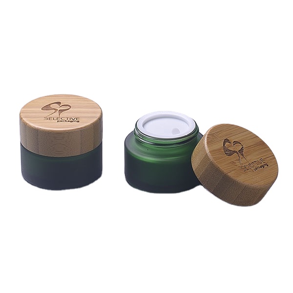 wholesale Frosted dark green  glass bottle glass cosmetic packaging  cream jar with bamboo lid