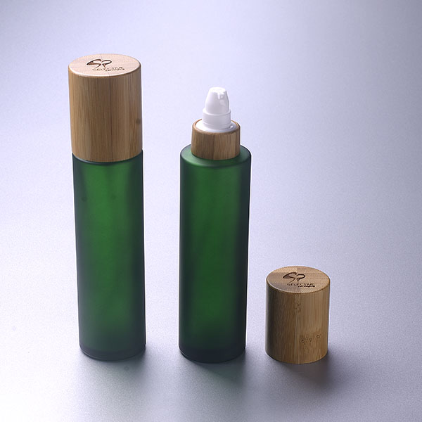 wholesale Frosted dark green glass bottle glass cosmetic packaging cream jar with bamboo lid