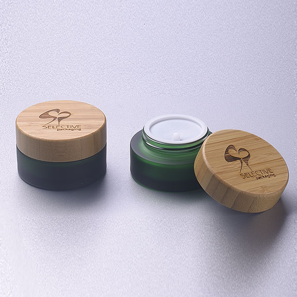 wholesale Frosted dark green glass bottle glass cosmetic packaging cream jar with bamboo lid