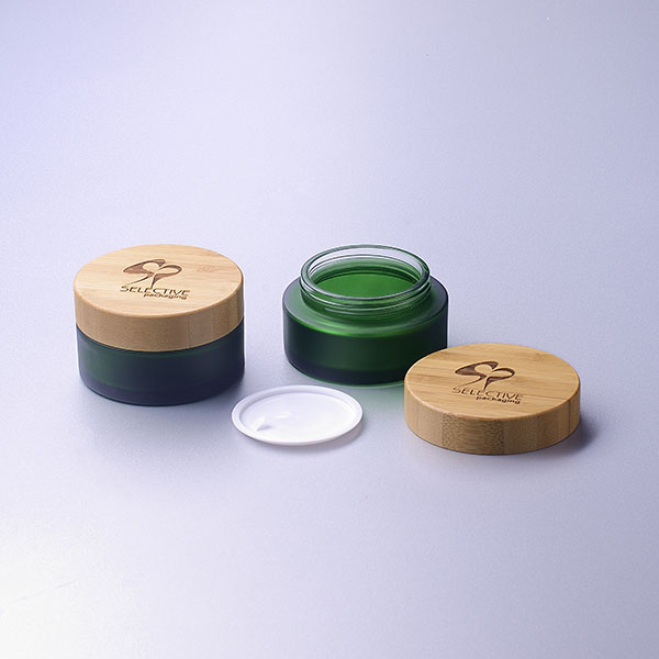 wholesale Frosted dark green glass bottle glass cosmetic packaging cream jar with bamboo lid