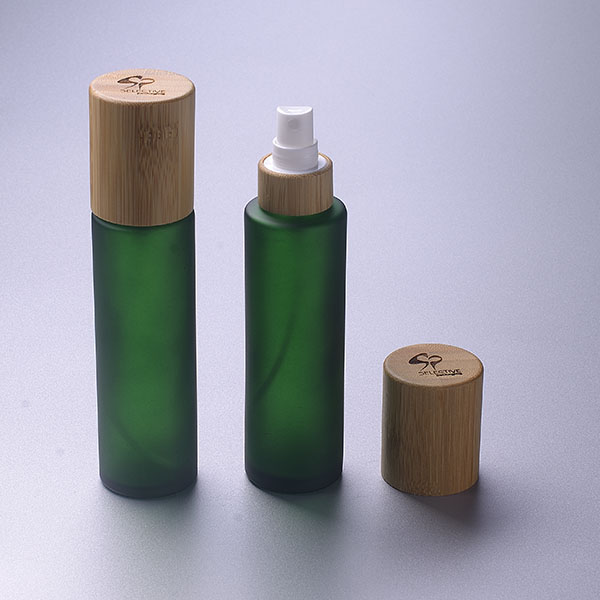 wholesale Frosted dark green glass bottle glass cosmetic packaging cream jar with bamboo lid