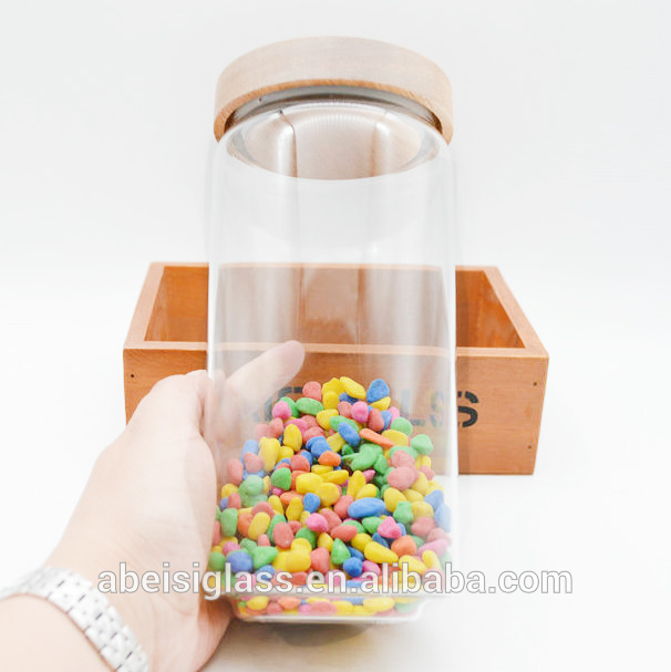 wholesale High quality borosilicate storage with wood lid recycled glass jar