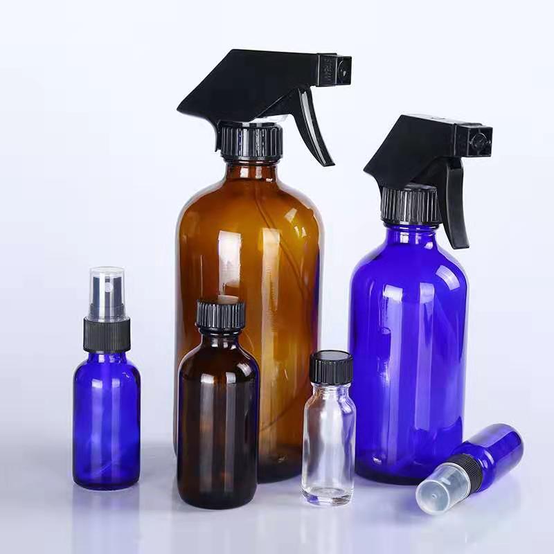 wholesale amber clear blue boston round glass refillable fine mist glass pump spray bottles