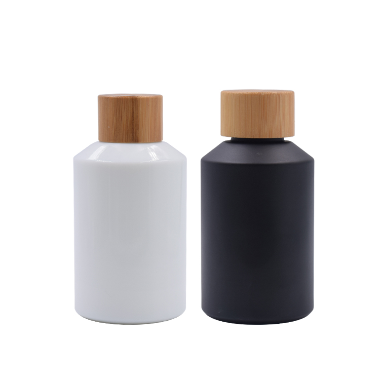 wholesale bamboo container 30ml 60ml 125ml wood and black glass cosmetic packaging with bamboo cap