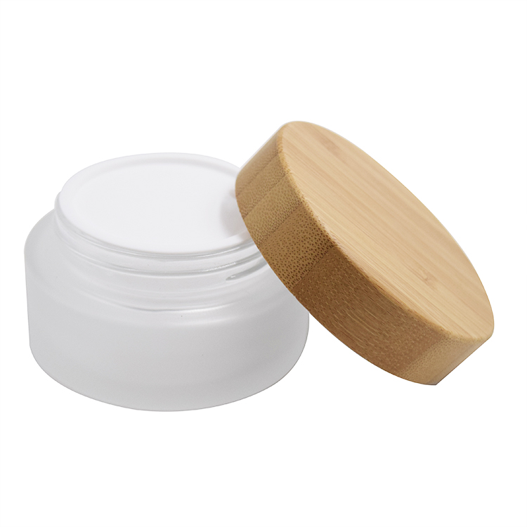 wholesale bamboo container cosmetic packaging high quality empty frosted glass jar with bamboo lid 50g