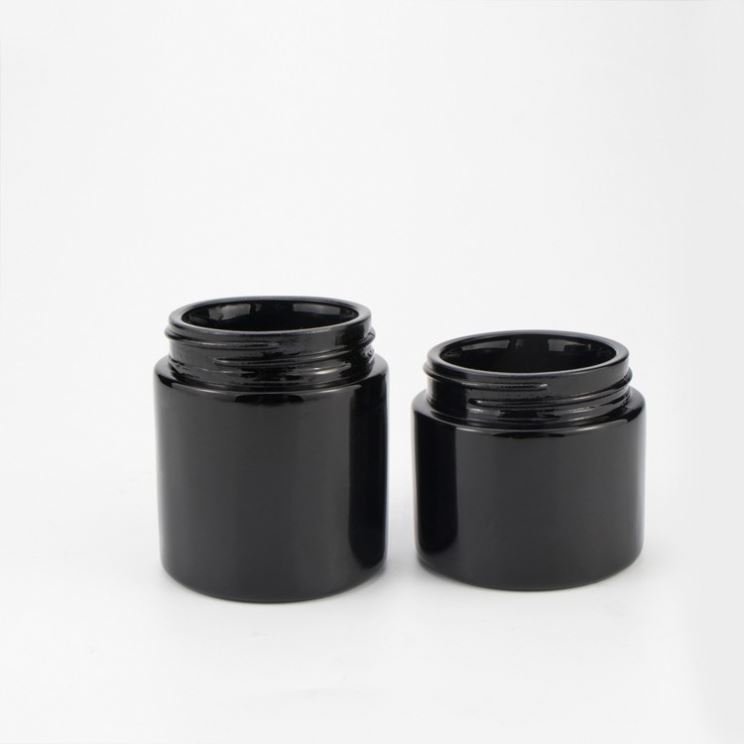 wholesale cheap 120g 4oz herb hemp food container black round straight slide glass jar with plastic black screw lid