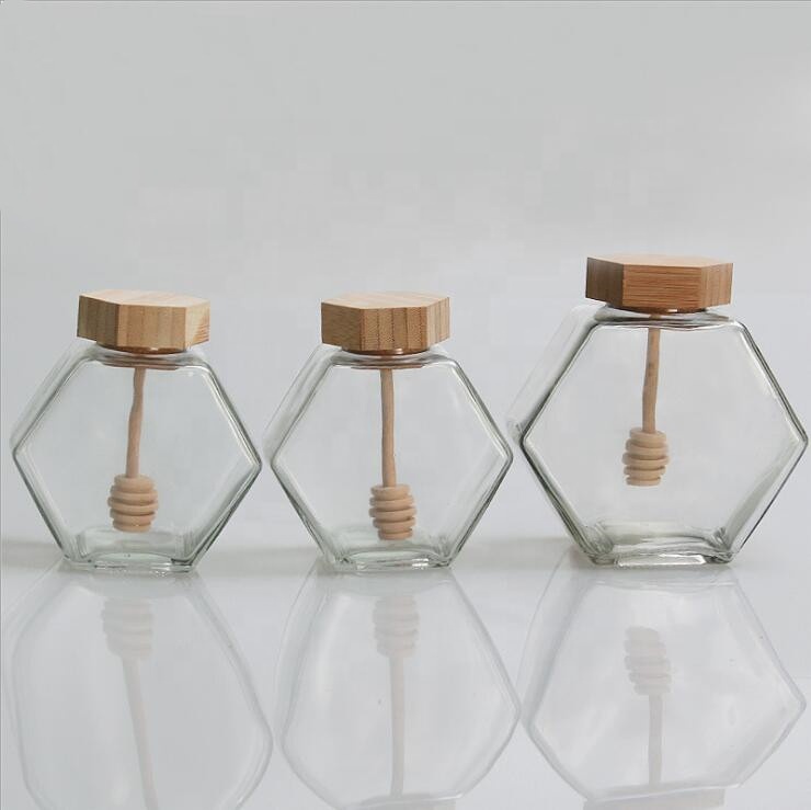 wholesale cheap 250ml honeycomb frosco vidrio hexagon polygon glass bottle honey bee glass jar with wood screw lid 8oz