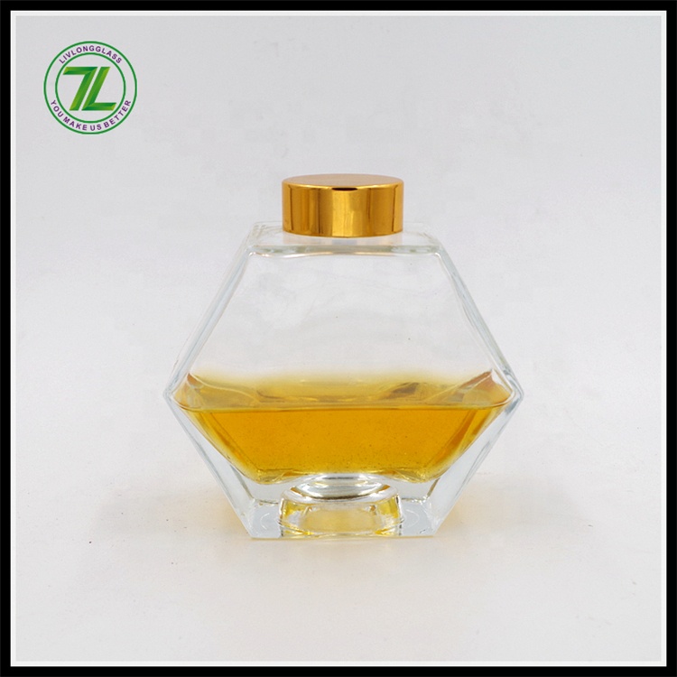 wholesale cheap 250ml honeycomb hexagon polygon glass bottle honey glass jar with gold screw lid