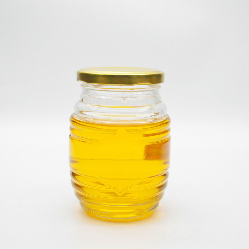 wholesale cheap food storage honey empty glass jars for canning with lid