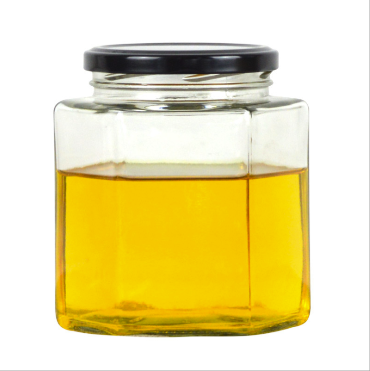 wholesale cheap hexagon food storage honey empty glass jars for canning with lid