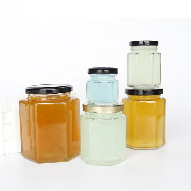 wholesale cheap hexagon food storagehoneyemptyglassjarsfor food canning with lid