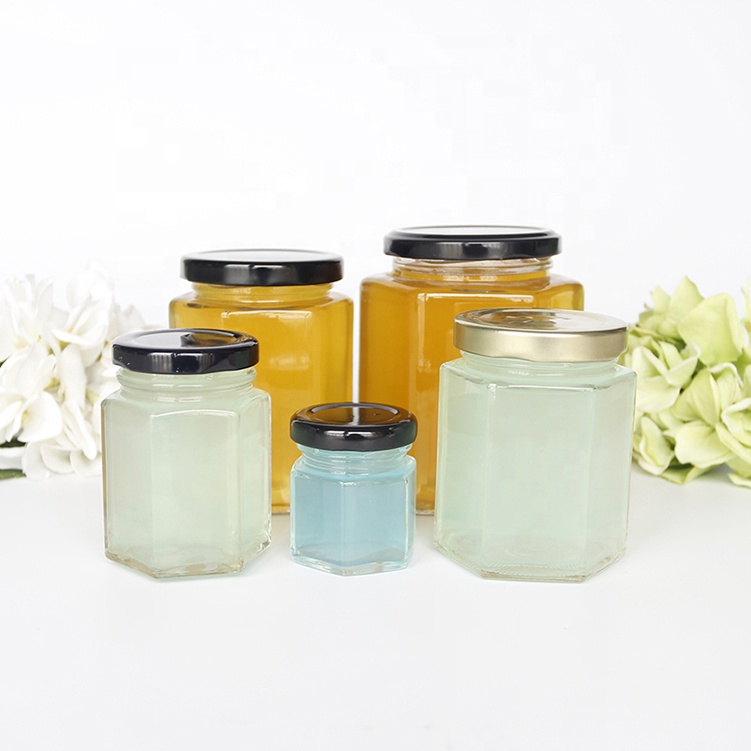 wholesale cheap hexagon glass storage honey empty glass jars for canning with lid