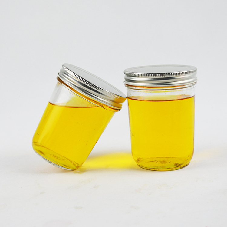 wholesale clear glass honey jar packaging with screw lid