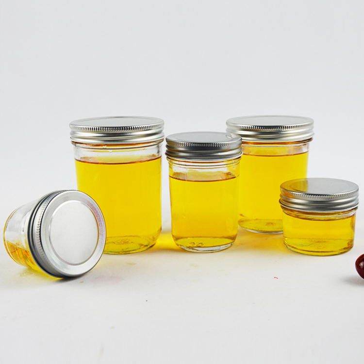 wholesale clear glass honey jar packaging with screw lid