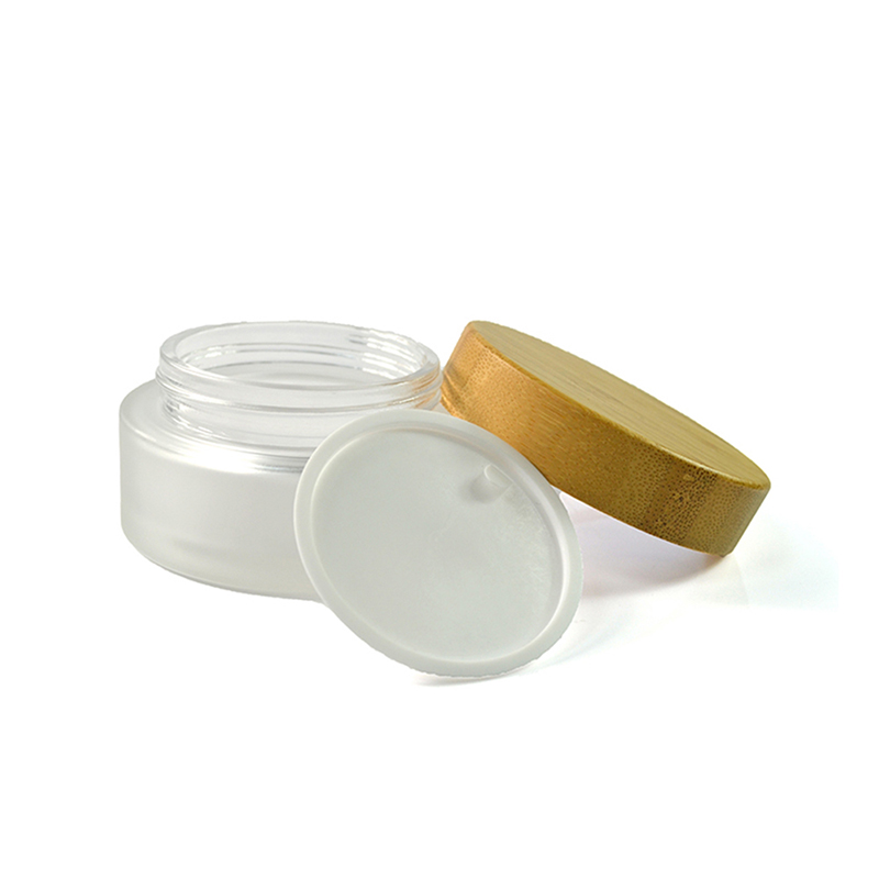 wholesale cosmetic containers skin care packaging 100g clear frosted glass cream jar with bamboo lid