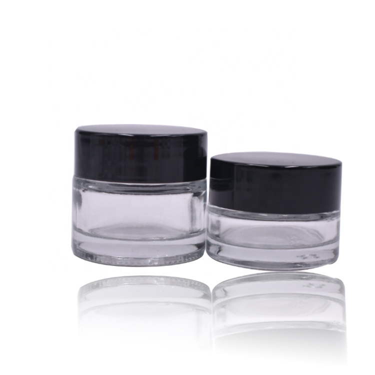 wholesale cosmetic glass jar cosmetic package black plastic lid empty clear cylinder 5ml glass jar with lid