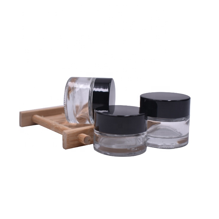 wholesale cosmetic glass jar cosmetic package black plastic lid empty clear cylinder 5ml glass jar with lid