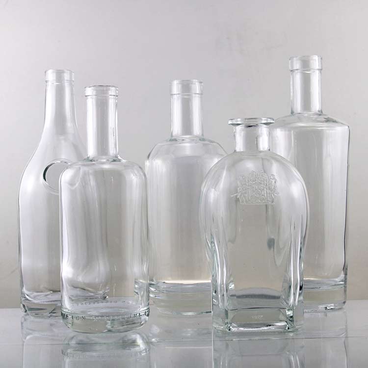 wholesale custom 500ml 700ml 75cl frosted luxury round empty clear vodka whiskey liquor spirit alcohol shape glass bottles 750ml