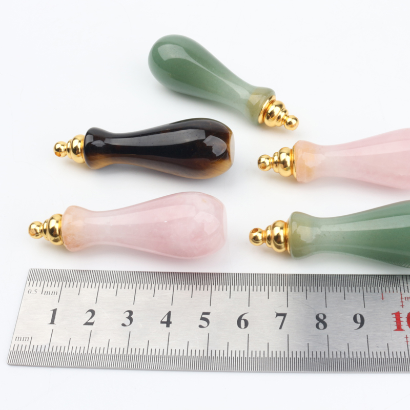 wholesale custom design natural rock crystal stone hand carved empty perfume bottle Oil Bottles