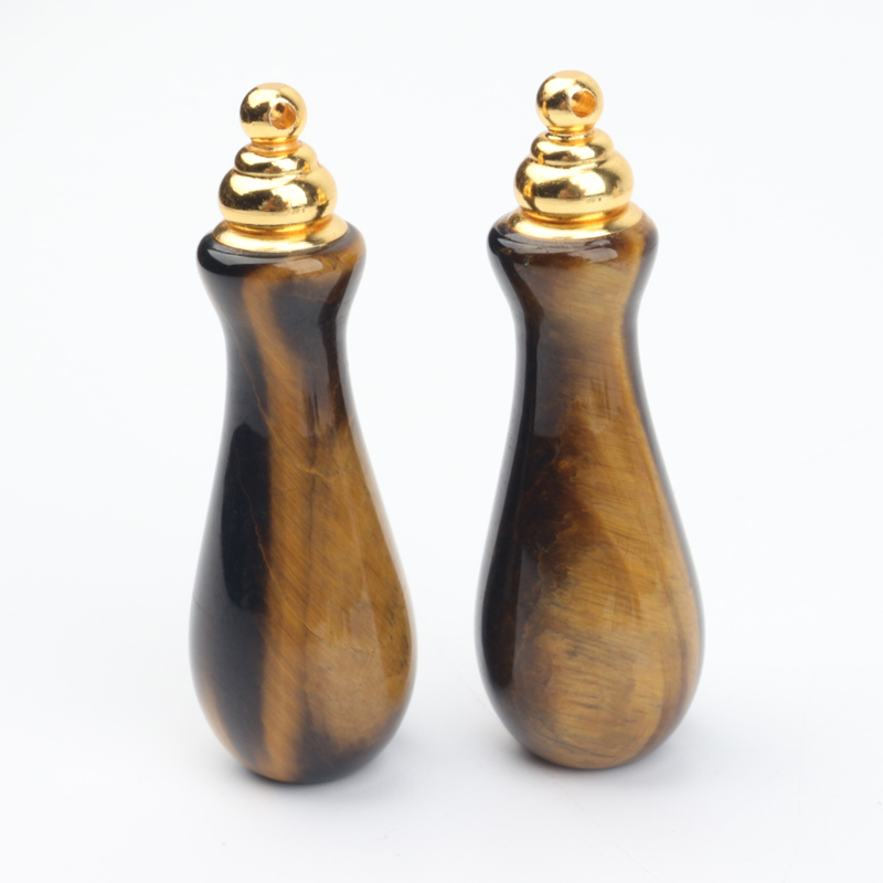 wholesale custom design natural rock crystal stone hand carved empty perfume bottle Oil Bottles
