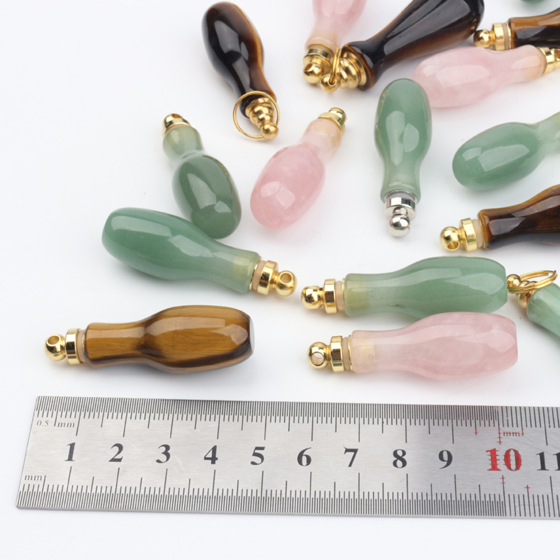 wholesale custom design natural rock crystal stone hand carved empty perfume bottle Oil Bottles