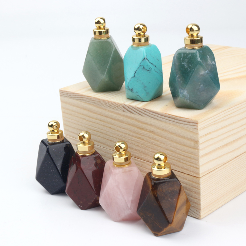 wholesale custom design natural rock crystal stone hand carved empty perfume bottle Oil Bottles