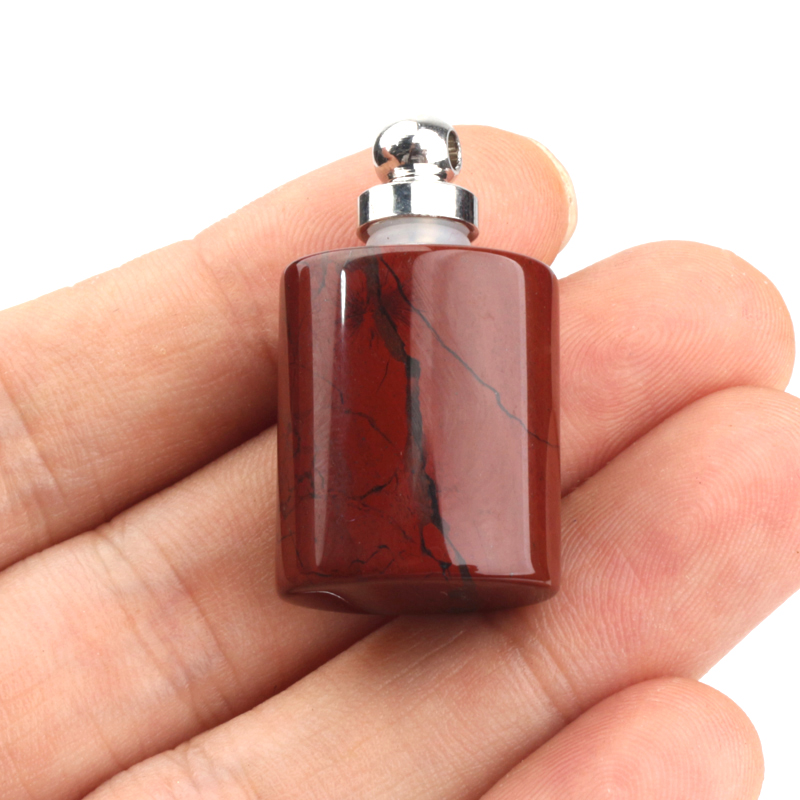 wholesale custom design natural rock crystal stone hand carved empty perfume bottle Oil Bottles