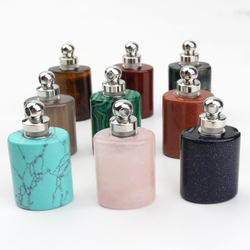 wholesale custom design natural rock crystal stone hand carved empty perfume bottle Oil Bottles