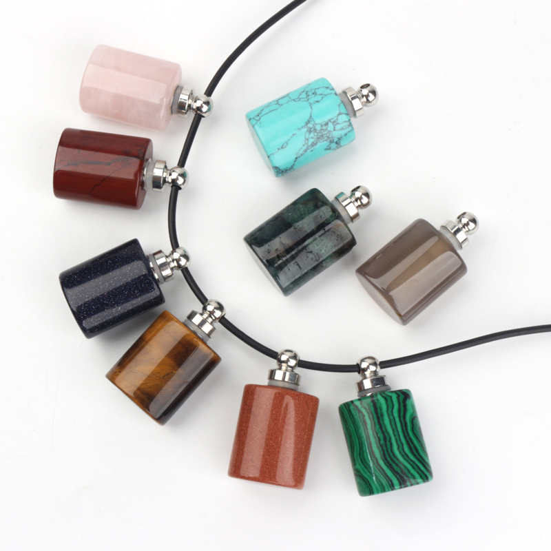 wholesale custom design natural rock crystal stone hand carved empty perfume bottle Oil Bottles