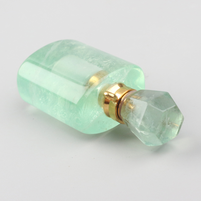 wholesale custom design natural rock crystal stone hand carved empty perfume bottle Oil Bottles