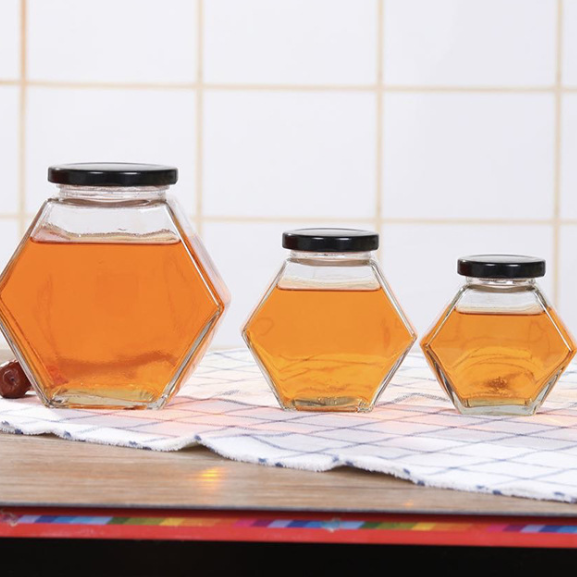 wholesale custom logo printing stock hexagon storage nuts canning spice container glass jars for honey